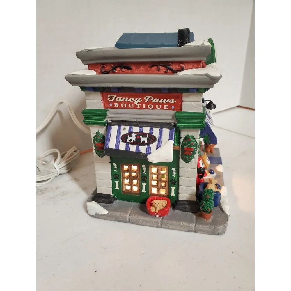 Lemax Fancy Paws Boutique, a lighted porcelain building from the Caddington...